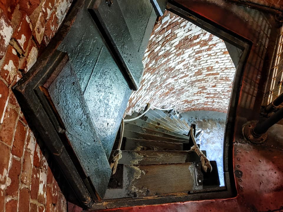 Spiral staircase inside Fire Island Lighthouse, one of the top Long Island family activities on the New York coast.