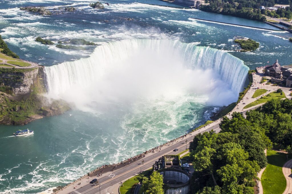 Panoramic aerial view of Horseshoe Falls, showcasing one of the best views of Niagara Falls and the powerful waterfall plunging into the Niagara River below.