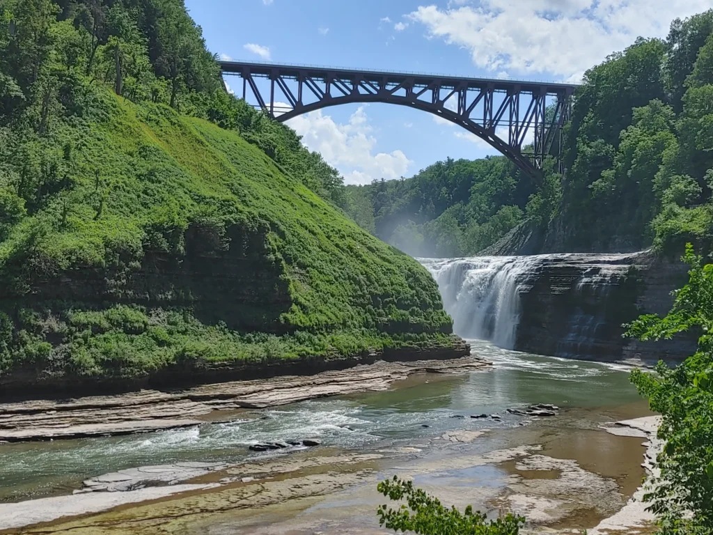 Upper Falls and railroad bridge overlooking the Genesee River Gorge at Letchworth State Park.